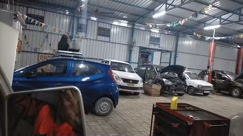 KM CARS -Best Car Service & Bodyshop ( Multi brand )